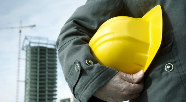 focus point on the hard-hat and hand, special photo toned f/x